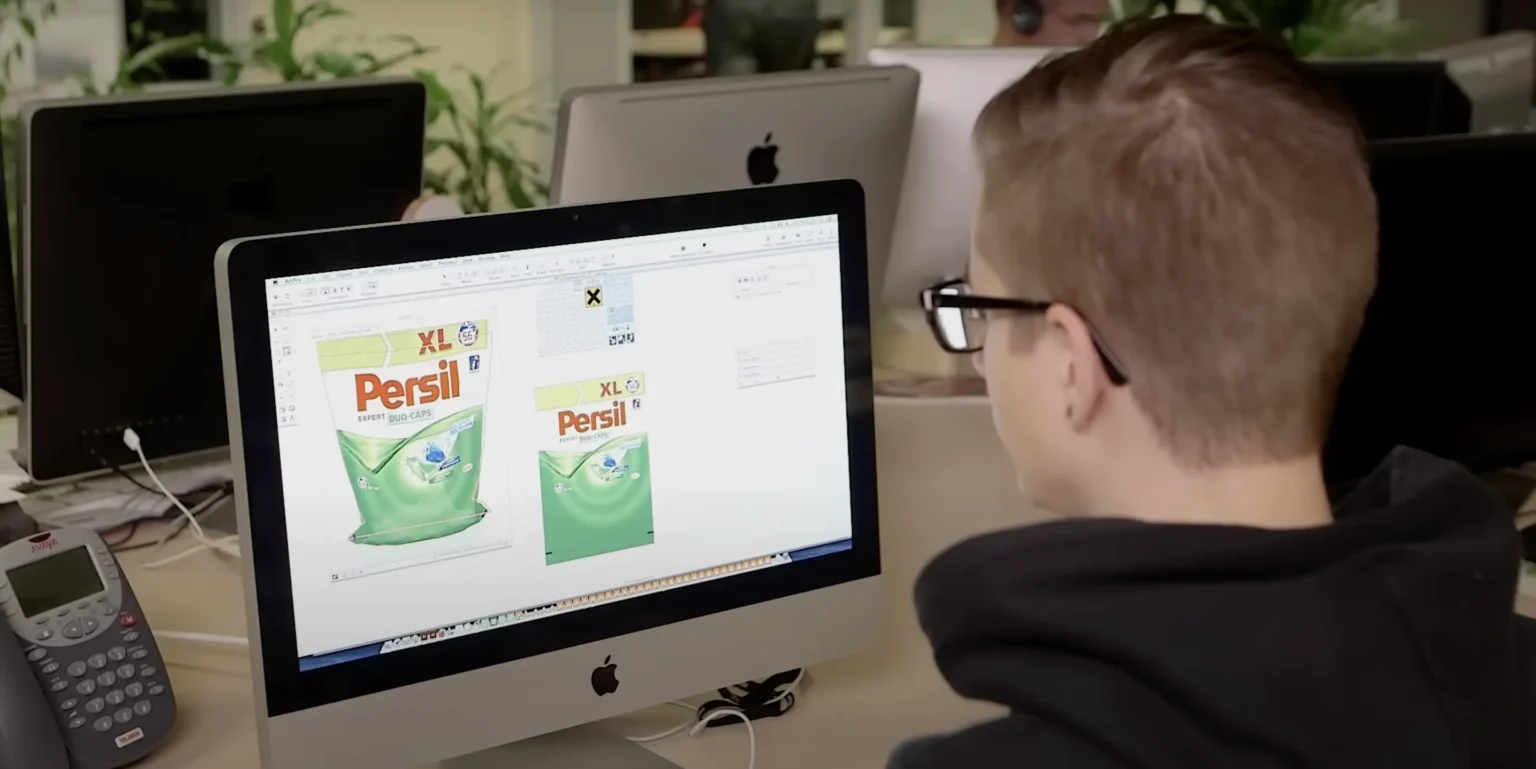 Photo of designer working on packaging software