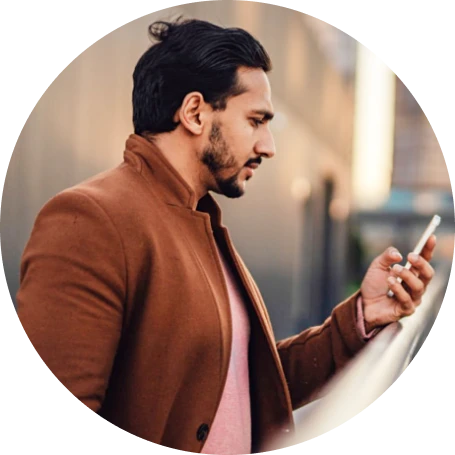 Photo of man using mobile phone